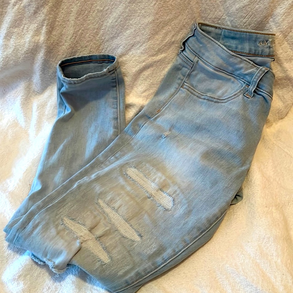 American Eagle Light blue distressed size 12 regular super low jegging